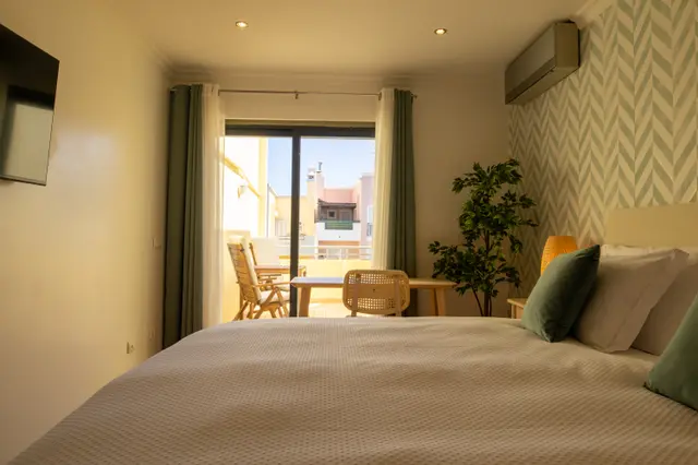 Sliding door from the bedroom onto the private terrace.